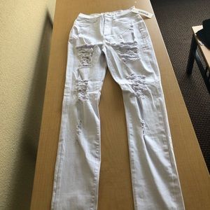High waisted white ripped jeans